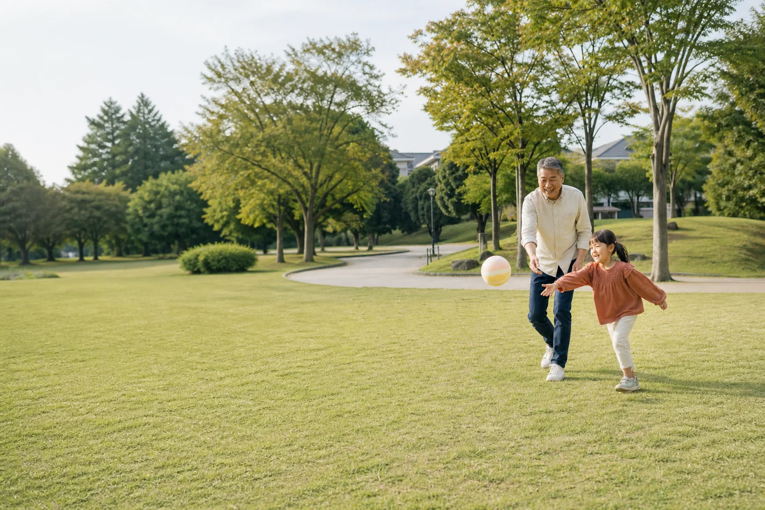 公園で子どもとボール遊びをする生成AIによるイメージ